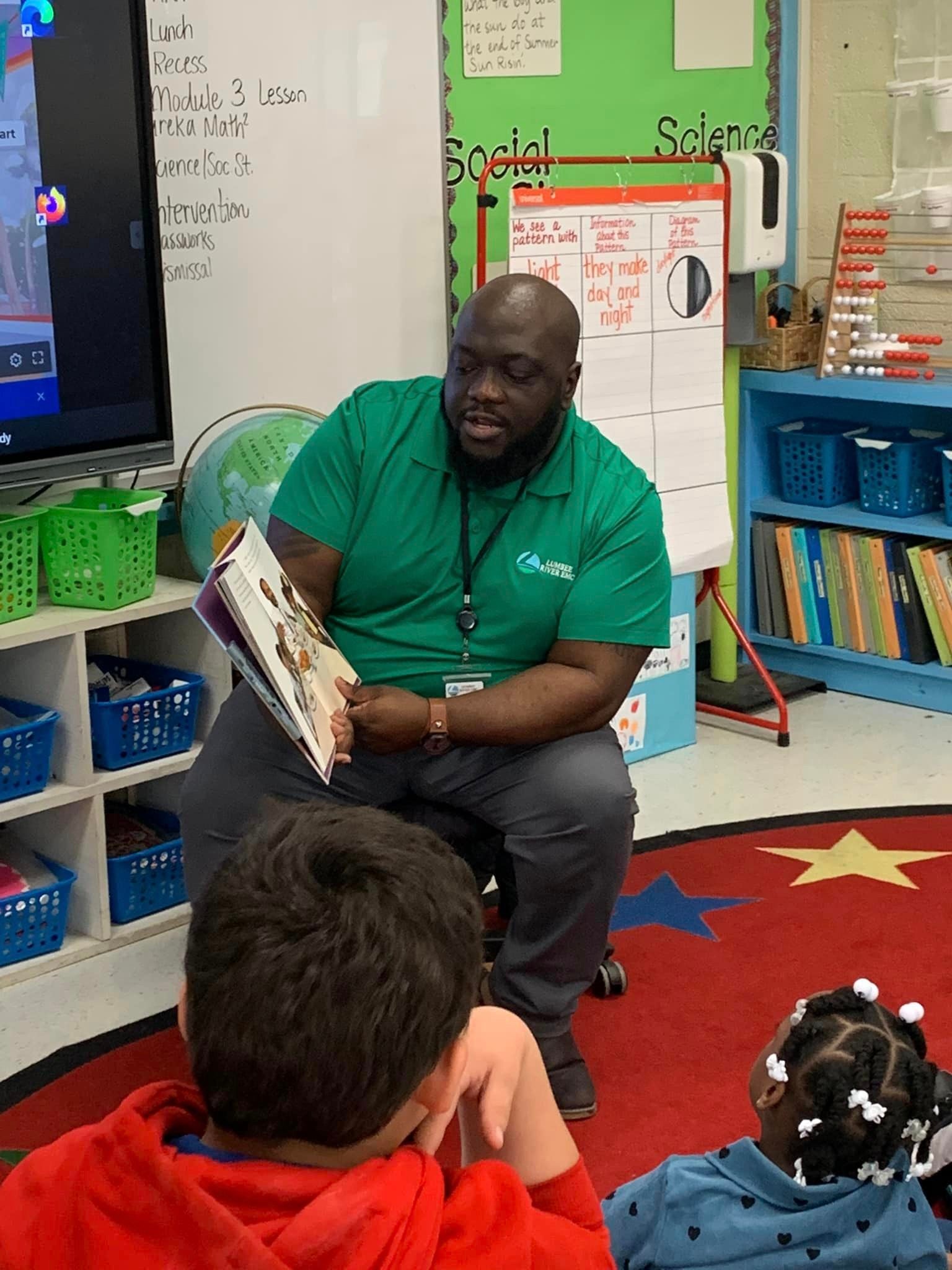 David Spencer Reading to students
